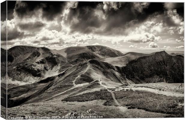 Dramatic view from the top of Grisedale Pike Canvas Print by Phill Thornton