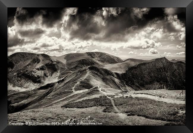 Dramatic view from the top of Grisedale Pike Framed Print by Phill Thornton