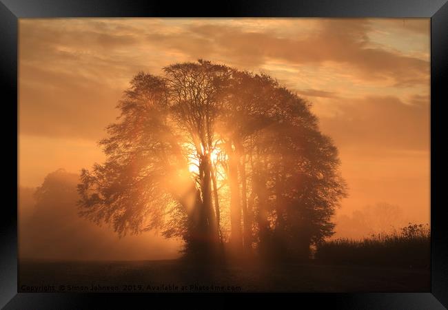 Misty Sunrise Framed Print by Simon Johnson