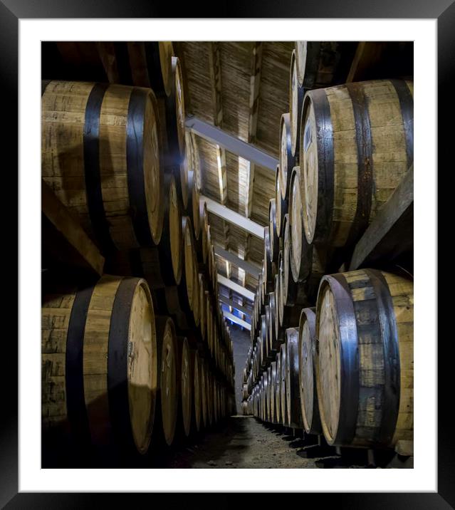 Whisky Barrels Framed Mounted Print by Mark Fraser