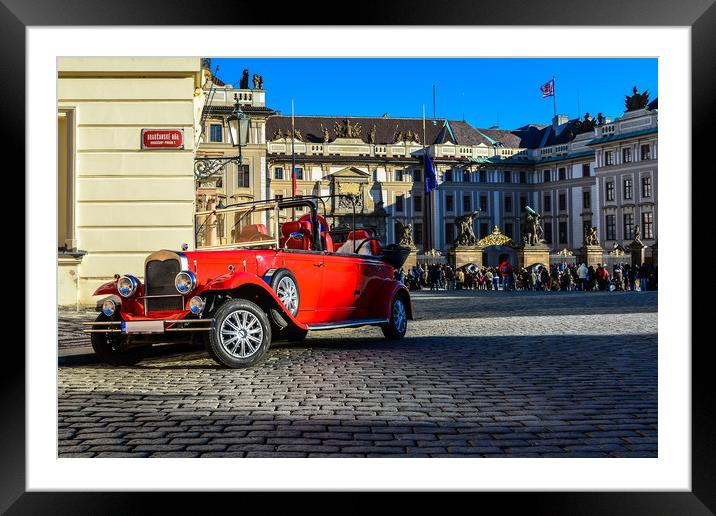Vintage red car and the Prague Castle Framed Mounted Print by Jelena Maksimova