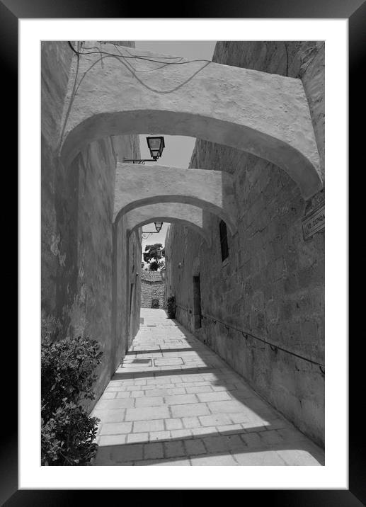 Limestone walled and arched alley Framed Mounted Print by Steve Talbot