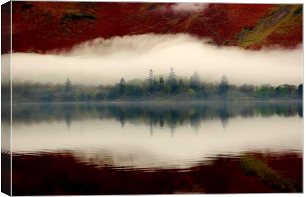 Reflections and mist Derwent Water Canvas Print by Simon Johnson