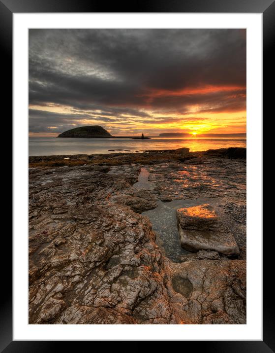 First Rays at Penmon Point, Anglesey Framed Mounted Print by Ian Homewood