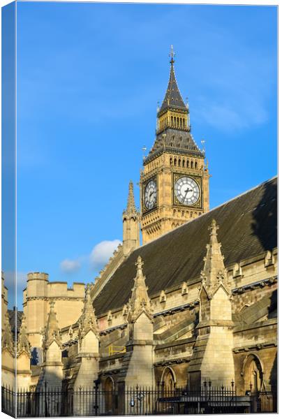 Big Ben Tower behind Westminster Abbey Canvas Print by Jelena Maksimova