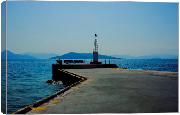 Lighthouse on Aegina Pier Canvas Print by Cassi Moghan