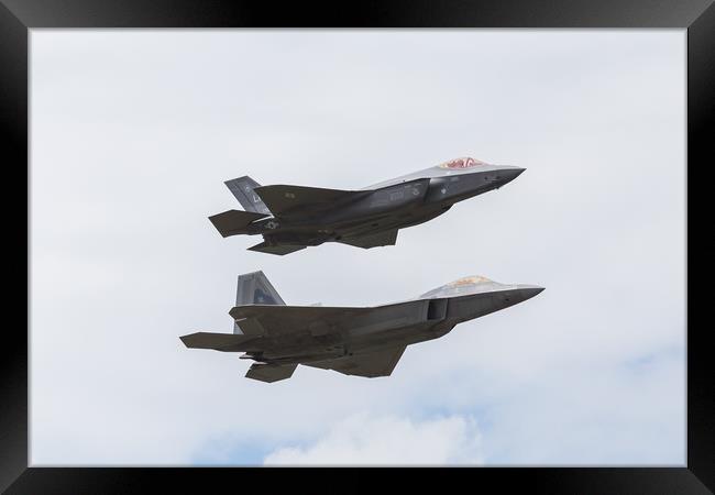 F-35A and F-22A stealth fighters Framed Print by Jason Wells