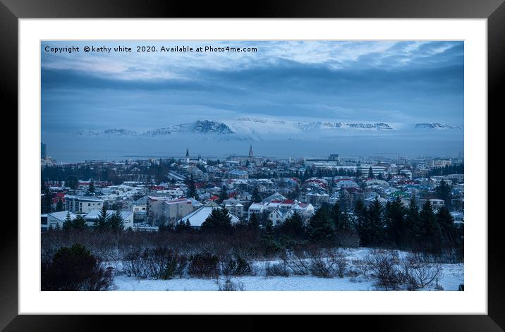 Reykjavik Iceland in the winter with snow  Framed Mounted Print by kathy white