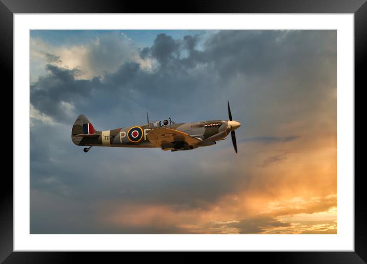 Spitfire in the clouds Framed Mounted Print by tim miller