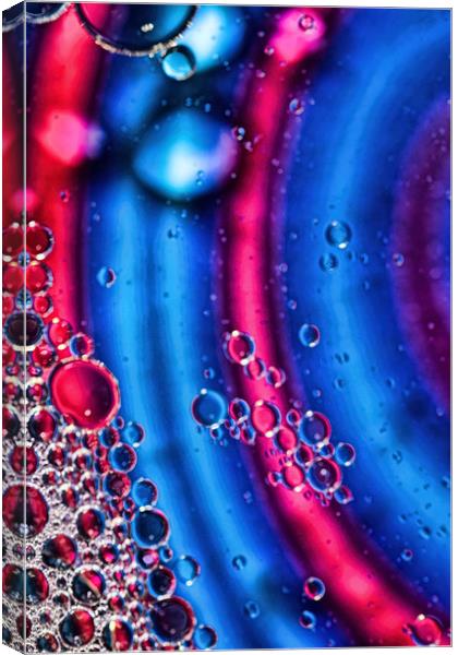 Oil On Water 7 Canvas Print by Steve Purnell