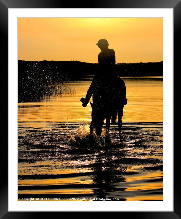 Horse and rider silhouettes at sunset Framed Mounted Print by HELEN PARKER
