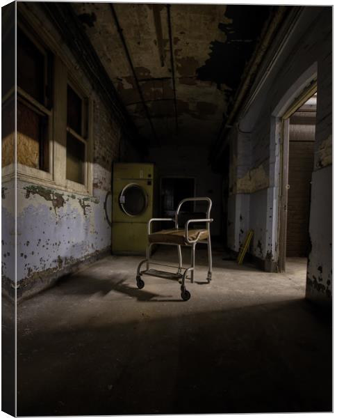 Old medical chair  Canvas Print by simon sugden