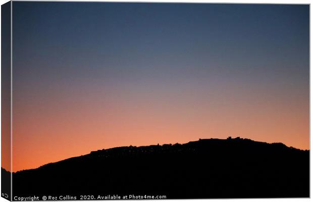 Marvão Silhouetted against the Evening Sky Canvas Print by Roz Collins