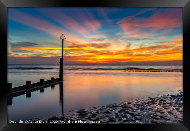 Sunset Reflections  Framed Print by Adrian Evans