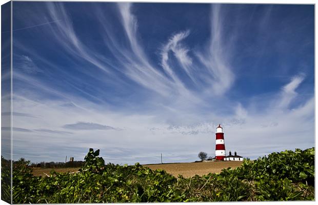 Wispy Clouds Above Happisburgh Lighthouse Canvas Print by Paul Macro