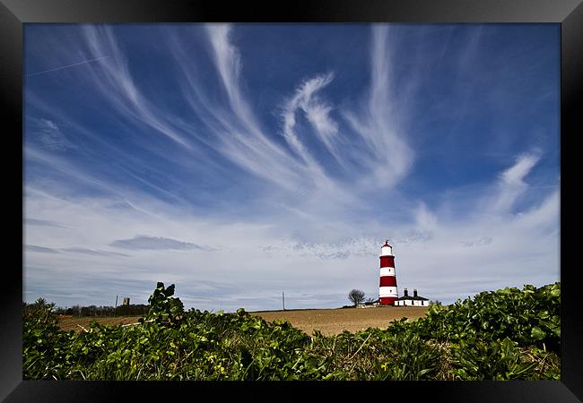 Wispy Clouds Above Happisburgh Lighthouse Framed Print by Paul Macro