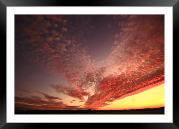 Dramatic  sunrise clouds Framed Mounted Print by Simon Johnson