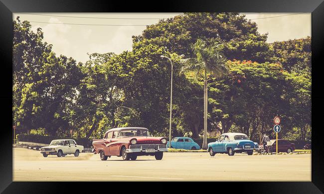 Old American cars pass Revolution Square Framed Print by Jason Wells