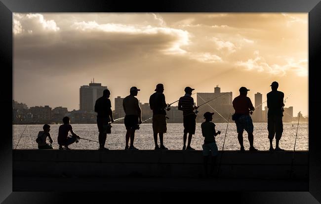Fishing off the Malecon at sunset Framed Print by Jason Wells
