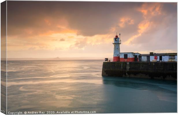 Newlyn Lighthouse at sunrise Canvas Print by Andrew Ray