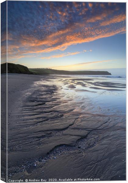 Sunrise over Pendower Beach Canvas Print by Andrew Ray
