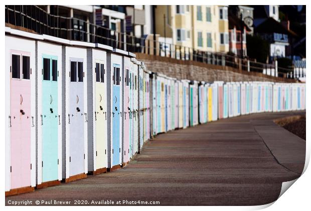Lyme Regis Beach huts Print by Paul Brewer
