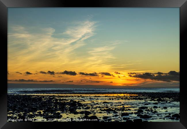 Sunset over Llantwit Major Beach  Framed Print by Nick Jenkins