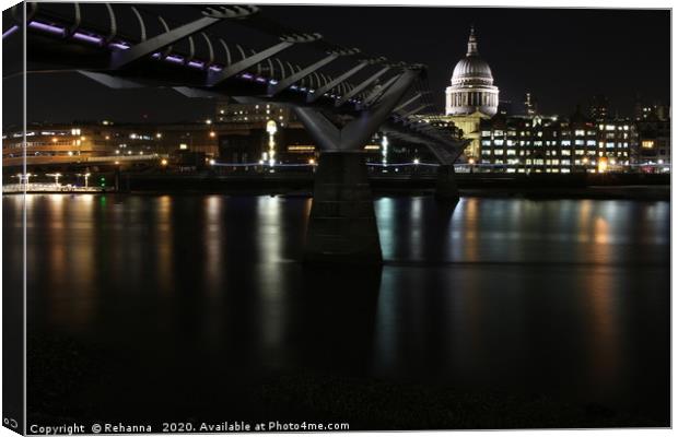 St Paul’s Cathedral with shimmering Thames Canvas Print by Rehanna Neky