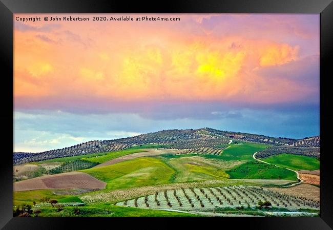 Sunset clouds, Andalusia, Spain Framed Print by John Robertson