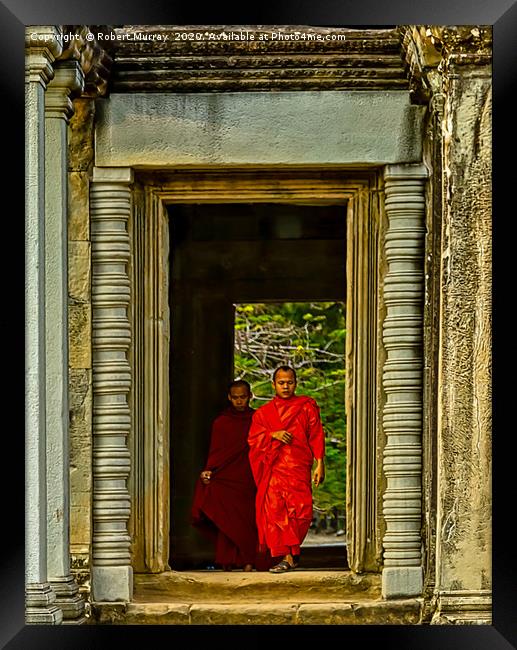 Buddhist Monk and Acolyte, Angkor Wat, Cambodia. Framed Print by Robert Murray