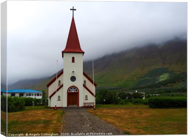 Icelandic Church in the Mist Canvas Print by Angela Cottingham