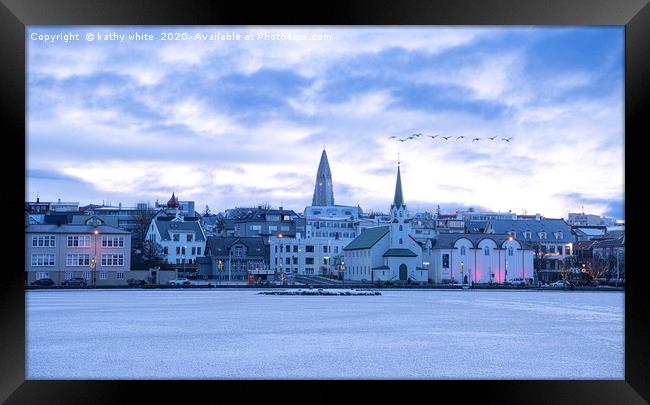 Reykjavik Iceland in the winter with snow Framed Print by kathy white