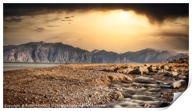Wild beach over mountains and dramatic sky. Print by RUBEN RAMOS