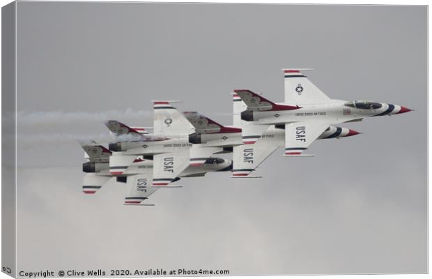 Thunderbirds in a four ship in formation at RIAT Canvas Print by Clive Wells