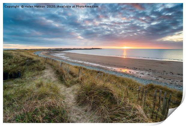 Dramatic sunset over the beach at Llandanwg Print by Helen Hotson