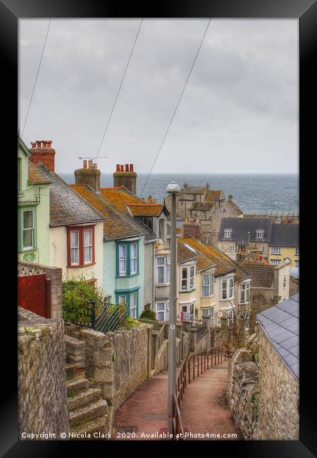 Terrace By The Sea Framed Print by Nicola Clark