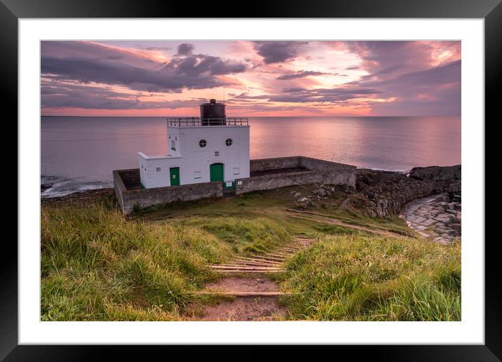 Bamburgh Lighthouse at sunrise Framed Mounted Print by Marcia Reay