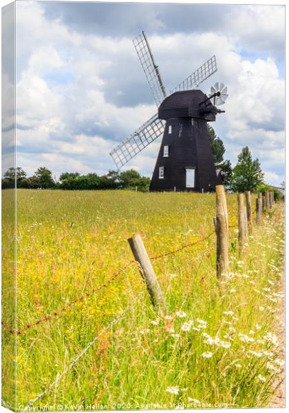 Lacey Green windmill Canvas Print by Kevin Hellon