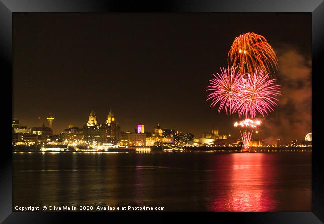 Fireworks over Liverpool waterfront Framed Print by Clive Wells