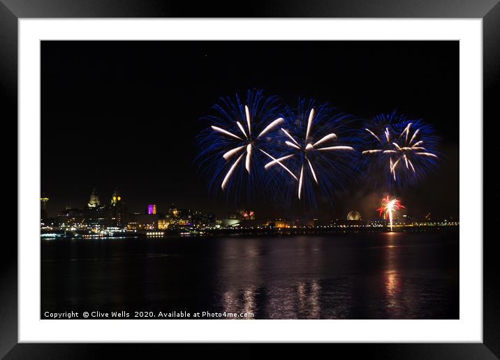 Fireworks high above Liverpool waterfront Framed Mounted Print by Clive Wells
