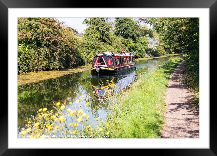 A narrowboat makes its way along the Grand Union c Framed Mounted Print by Kevin Hellon