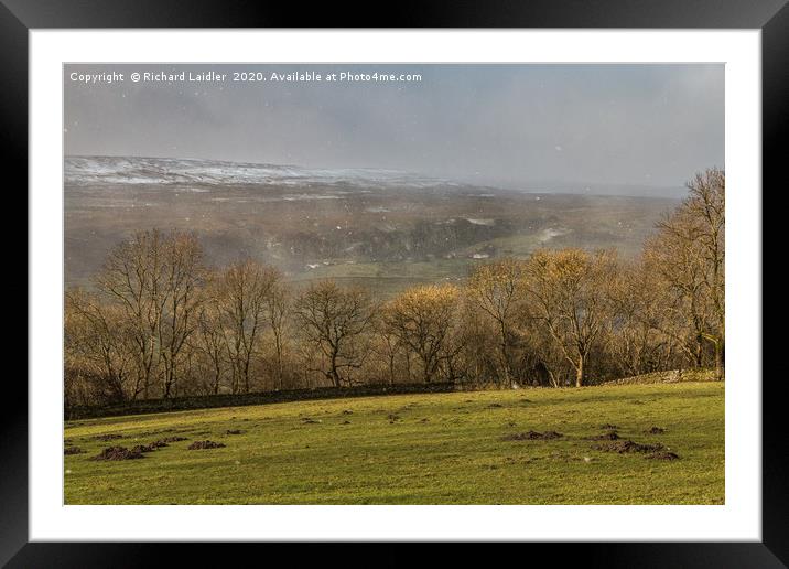 Across to Holwick in Dramatic Light and Snowstorm Framed Mounted Print by Richard Laidler