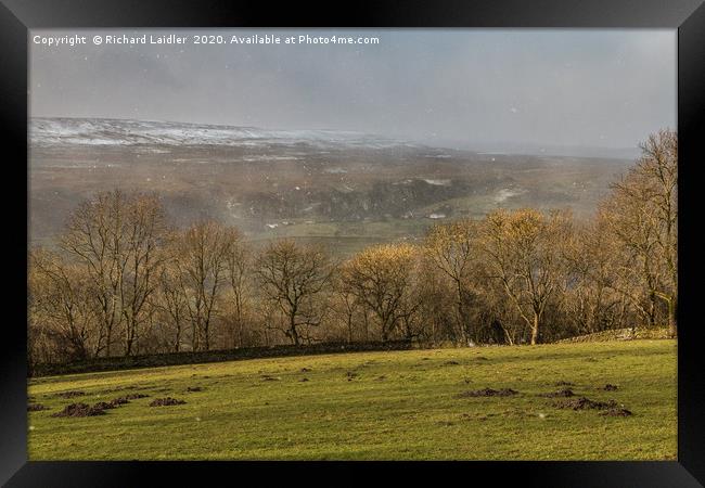Across to Holwick in Dramatic Light and Snowstorm Framed Print by Richard Laidler