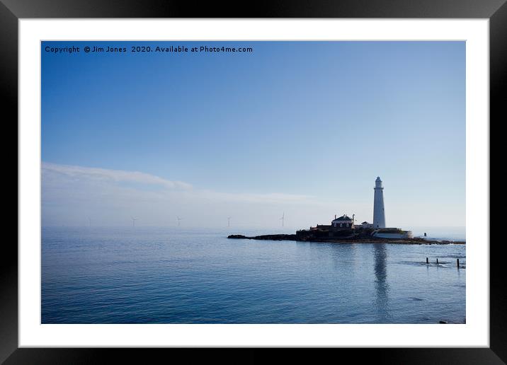 St Mary's Island in a blue haze. Framed Mounted Print by Jim Jones