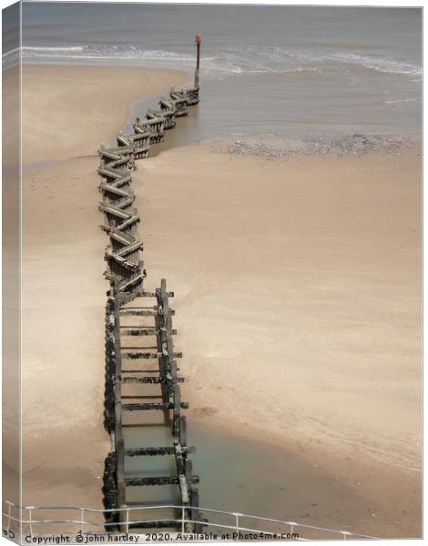 The Zig Zag sea defence groyne at Overstrand North Canvas Print by john hartley