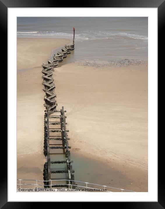 The Zig Zag sea defence groyne at Overstrand North Framed Mounted Print by john hartley