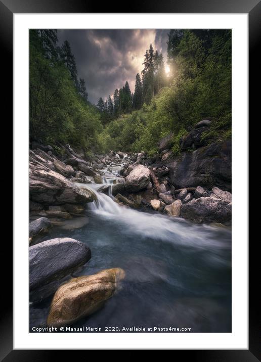 Clash of clouds Framed Mounted Print by Manuel Martin