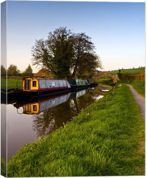 Evening on the canal Canvas Print by David (Dai) Meacham