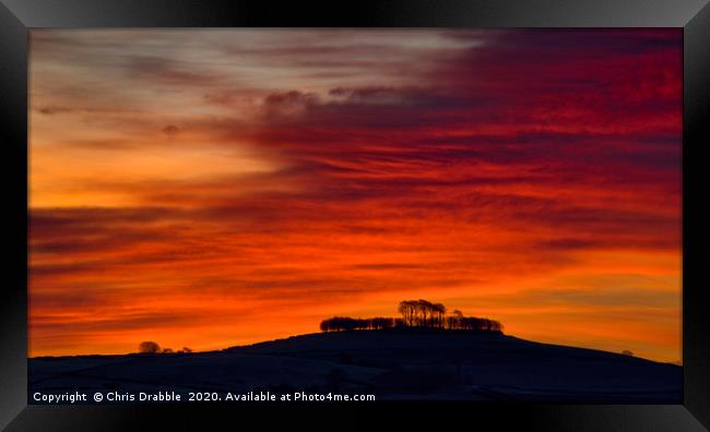 Minninglow with light from the rising sun (1) Framed Print by Chris Drabble