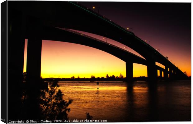 Sunset Over The Sir Leo Hielscher Bridges. Canvas Print by Shaun Carling